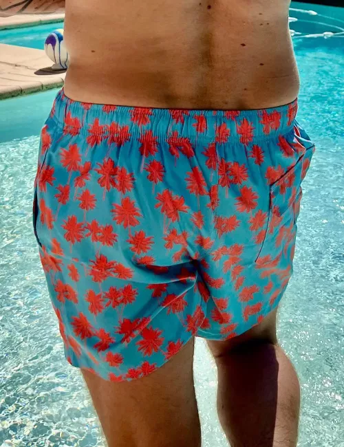 Boardshort homme turquoise motif palmiers rouges, nœud de serrage et poche au dos - tailles S à XXL